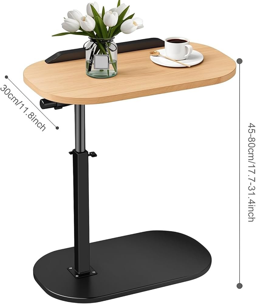 طاولة جانبية عملية وأنيقة بلون الجوز، بارتفاع قابل للتعديل وسطح متين. مثالية للعمل أو الاستخدام اليومي بجانب الأريكة، مع قاعدة ثابتة توفر الراحة والاستقرار